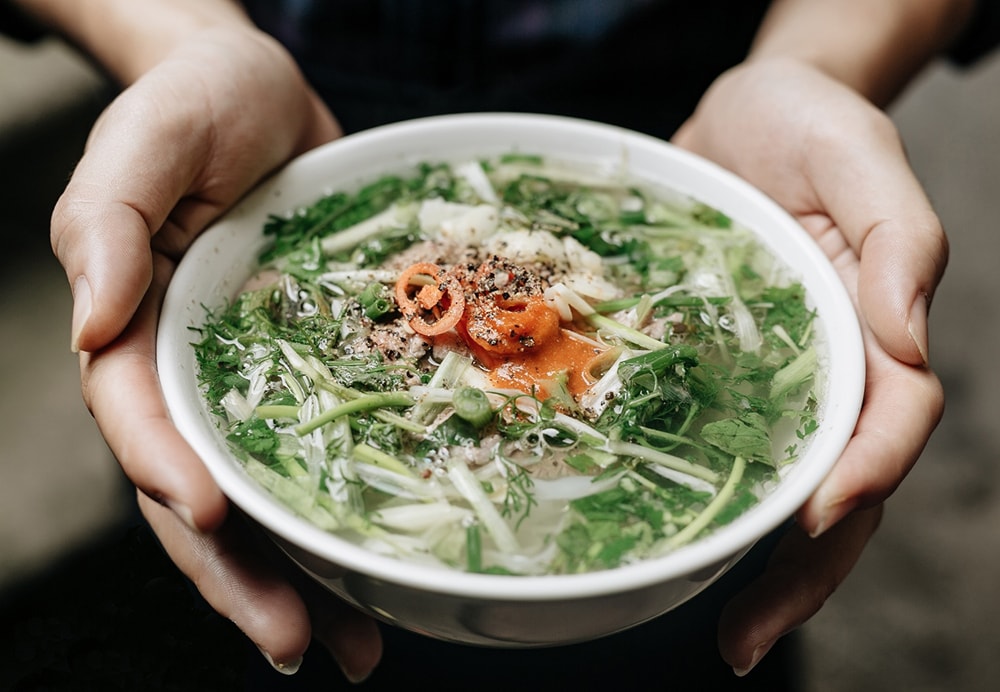 A steaming bowl of Pho Thin Bo Ho
